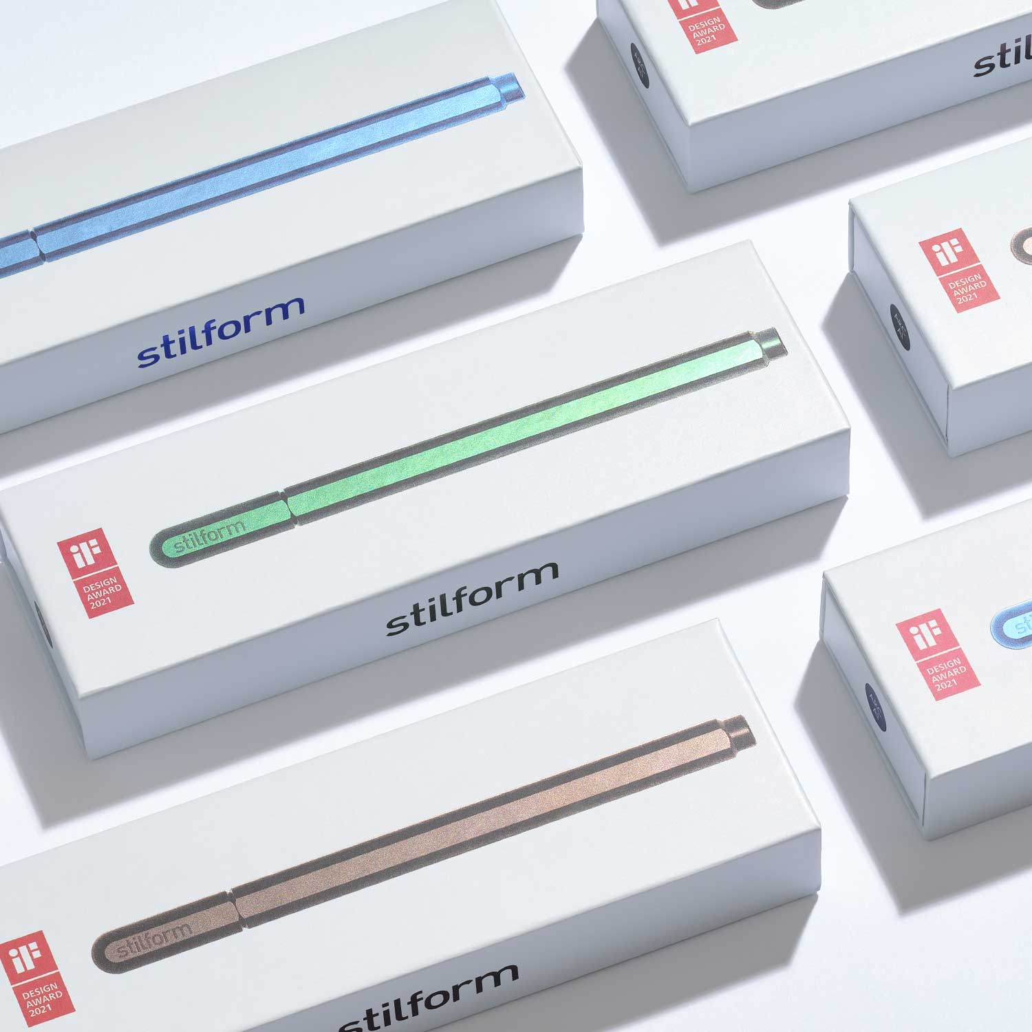 Verpackungen des Gelschreiber Aluminium ARC mit stilform-Logo und farbiger Produktabbildung auf weißer Schachtel